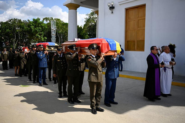 Venezuela's interior minister says 100 people died in US attack