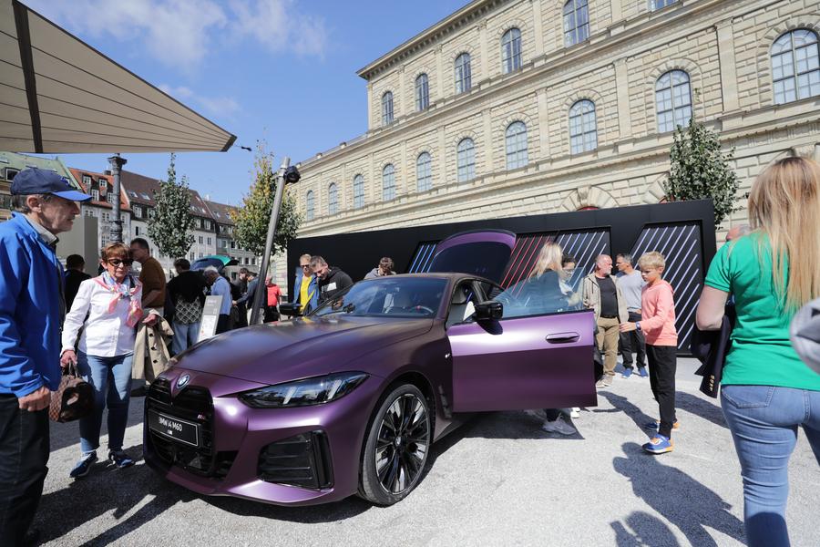 German auto giants report profit slumps, blame U.S. tariffs