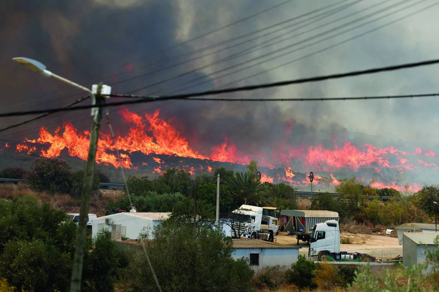 Wildfire Devastates an Expat Community in Southern Spain, Killing at Least 12 with 23 Missing