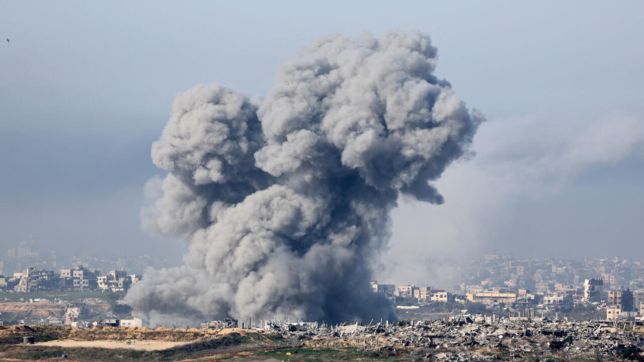 Israel launches fresh strikes on Gaza, halts humanitarian aid