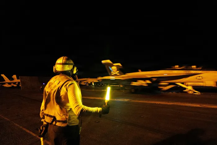 U.S. military fires on oil tanker attempting to "violate" Iran ports blockade