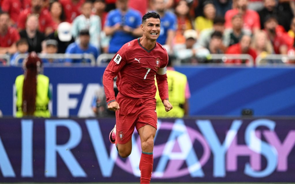 Ronaldo strikes twice as Portugal whitewashes Uzbekistan in Group K