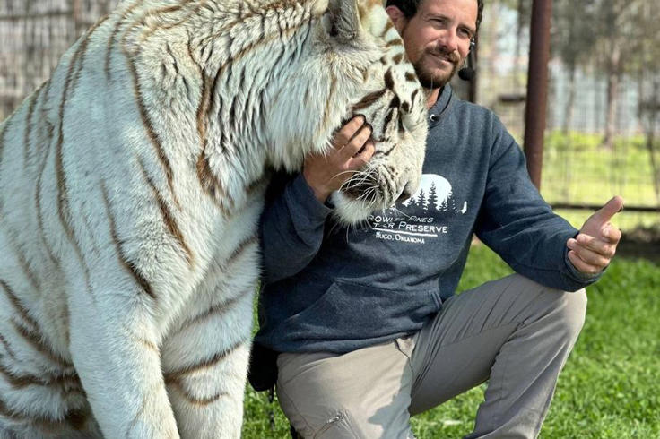 Zoo handler killed by huge tiger as tourists including his wife and daughter watched in horror