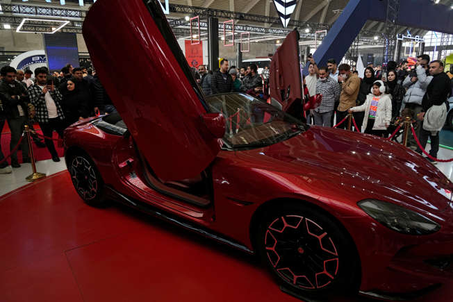 Iran loosens import restrictions on foreign cars and iPhones, trying to mask its economic woes