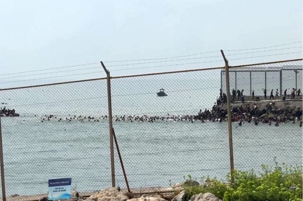 Spain reinforces Ceuta border as migrant surge leaves at least 9 dead