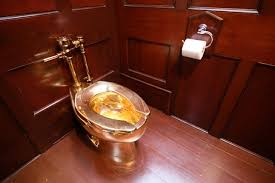 " Trial of the Golden Toilet thieves ... 3 individuals face charges while the piece is still missing."