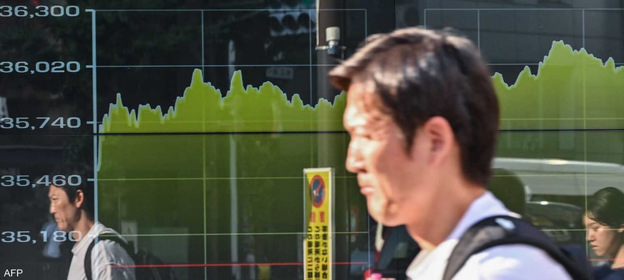 Tokyo stocks end mixed as firm yen hits exporters