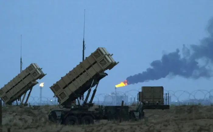 Kuwaiti military says air defense systems responding to missile, drone attacks